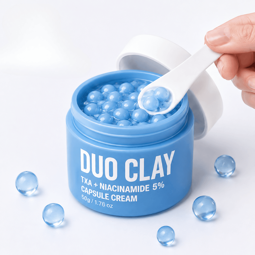 Spatula scooping Duo Clay capsule cream from the jar